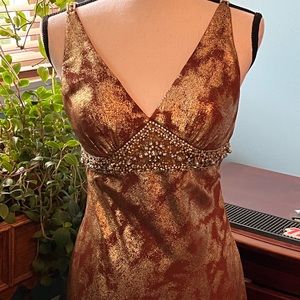 Beautiful Rust & gold sexy gown with fine detail